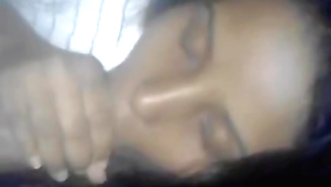 Indian brunette with big boobs sucks a dick from behind