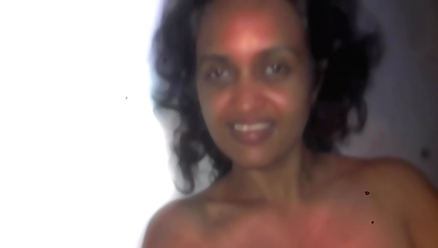 Busty amateur brunette in a sexy dress and stockings