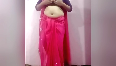 Sexy indian brunette masturbates with a pen on the webcam