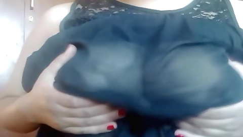 Busty chick spreads legs wide and makes her ass look sweet