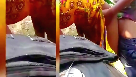 Indian babe with a shaved butt riding doggy style outdoors