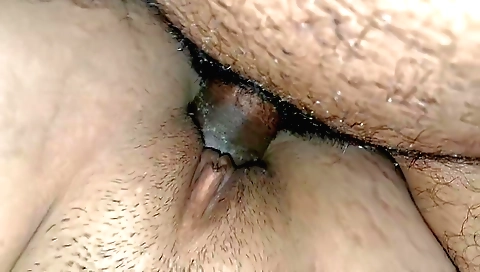 Indian wife fucks her pussy on her bed in amateur porn