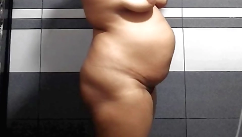 Indian aunt naked in her house and shows her big tits