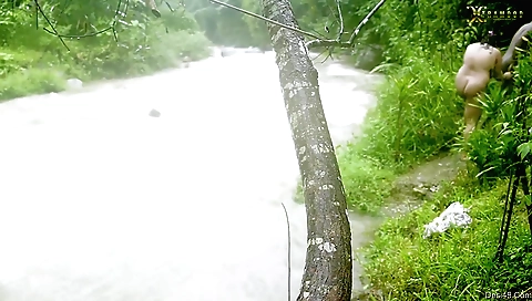 Blonde babe takes off bikini and gets naked outdoors