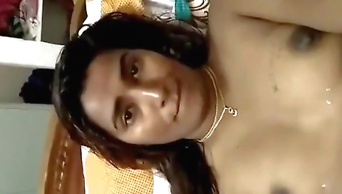 Brunette amateur amateur woman with small boobs plays with a toy