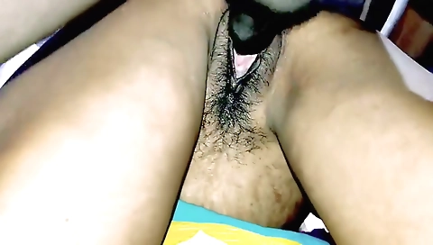 Indian hairy bhabi spreads legs for a camera in webcam clip
