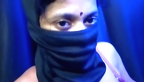 A milf with a nice ass is on her knees and she is showing off her body