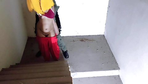 Indian teen 18+ wearing a red dress and khaki shorts