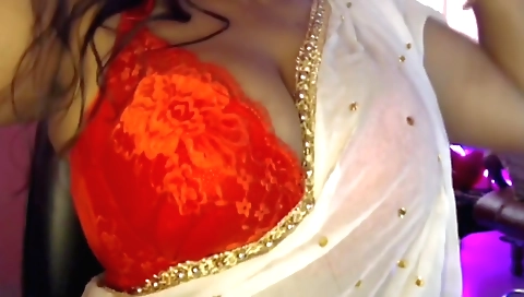 Sari is getting her big tits and ass stretched in this video