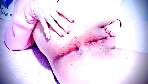 Indian teen masturbates in front of the window in this solo scene