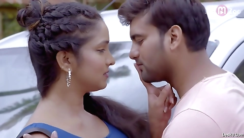 Brightly dressed brunette gym teacher gets her gym socks off