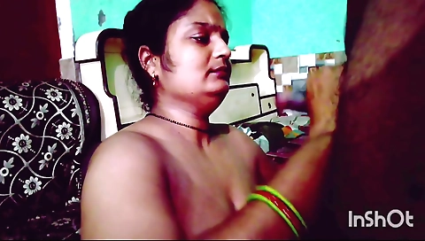 Indian amateur porn video showing a hot milf with tits
