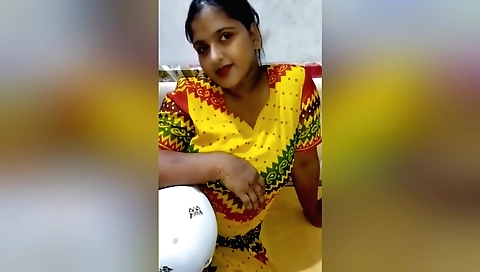 Indian chick playing with a shopping basket in front of the camera