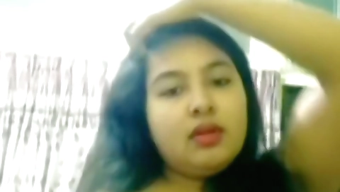 Indian beauty in a nude video showing off her tits