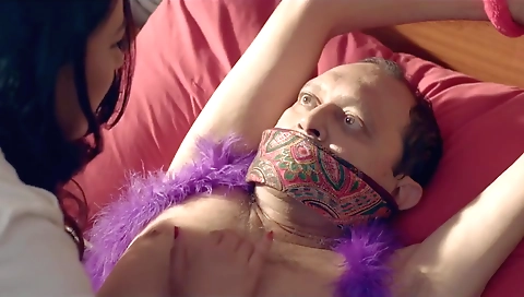 Busty milf doctor seduces a horny client with a dildo