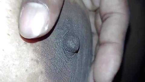 Sexy amateur milf in red shorts fucks herself on bed