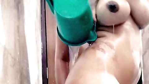 Busty indian chick with large boobs naked in shower