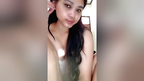 Indian beauty is taking a shower and she is doing it