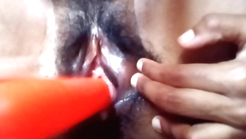 Indian housewife with sexy dress masturbates with vibrator