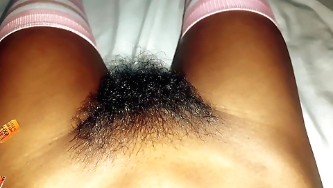 Indian schoolgirl in uniform and stockings has a hairy pussy