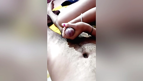 Indian girl is getting her hair shaved and tied up