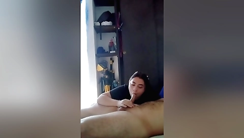 A brunette is showing off her tits and her big ass