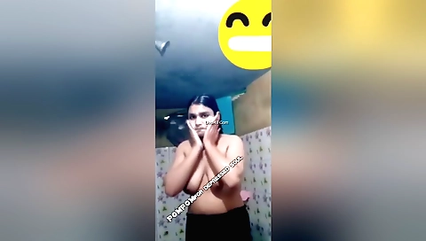 Big tits brunette chick in a sexy outfit is stripping